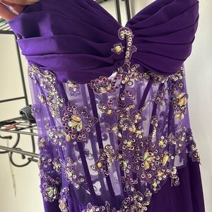 Size 8. Strapless formal wear dress with high side slit.